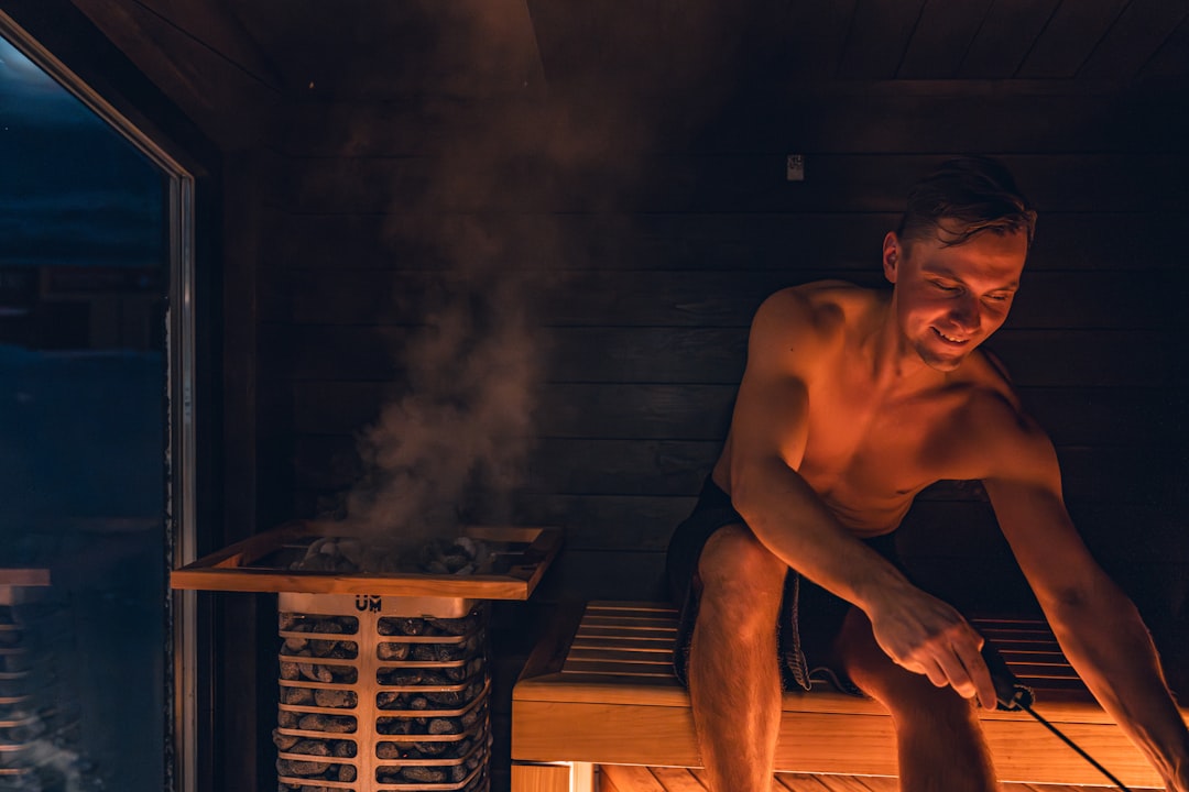 Man sitting in a hybrid sauna