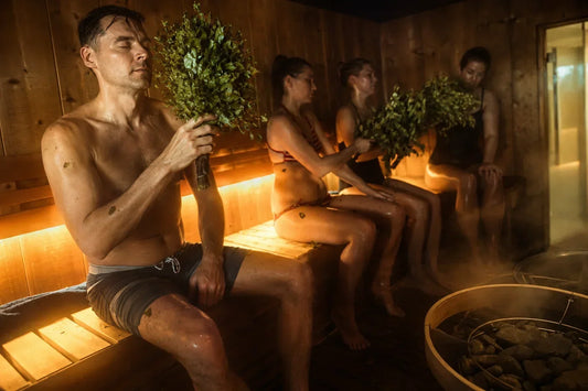 man and women in a sauna setting