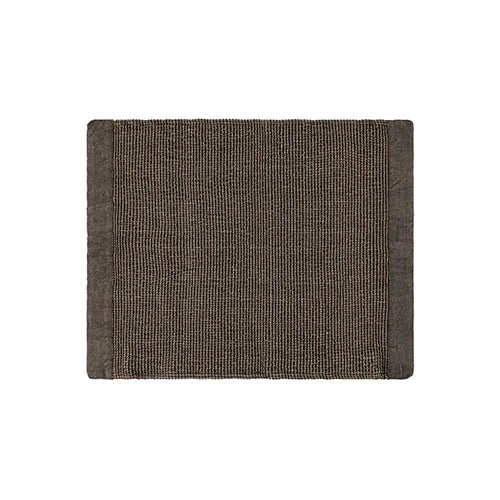 A rectangular woven placemat with a textured, ribbed surface and solid borders, shown flat against a plain white background.