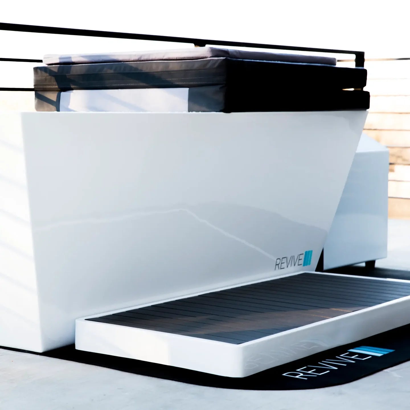 White and black Cold tub  labeled 'REVIVE' on a white background