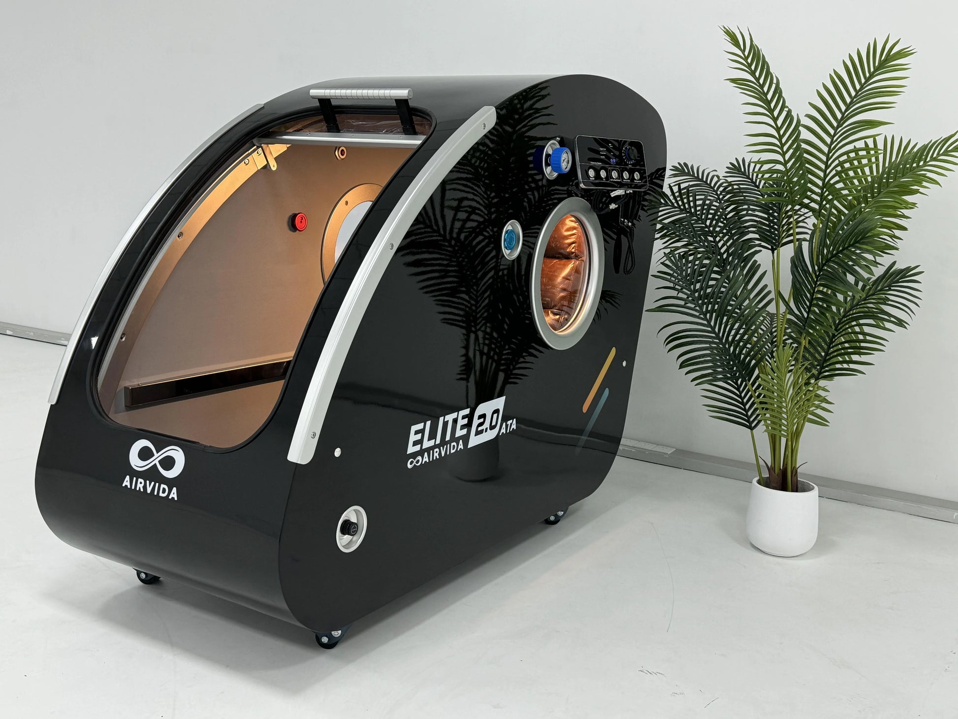  Hyperbaric Chamber with 'AirVida' branding on a white floor with a plant in the background