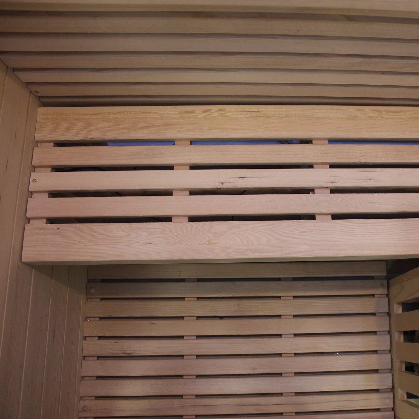 Wooden sauna interior with slatted design
