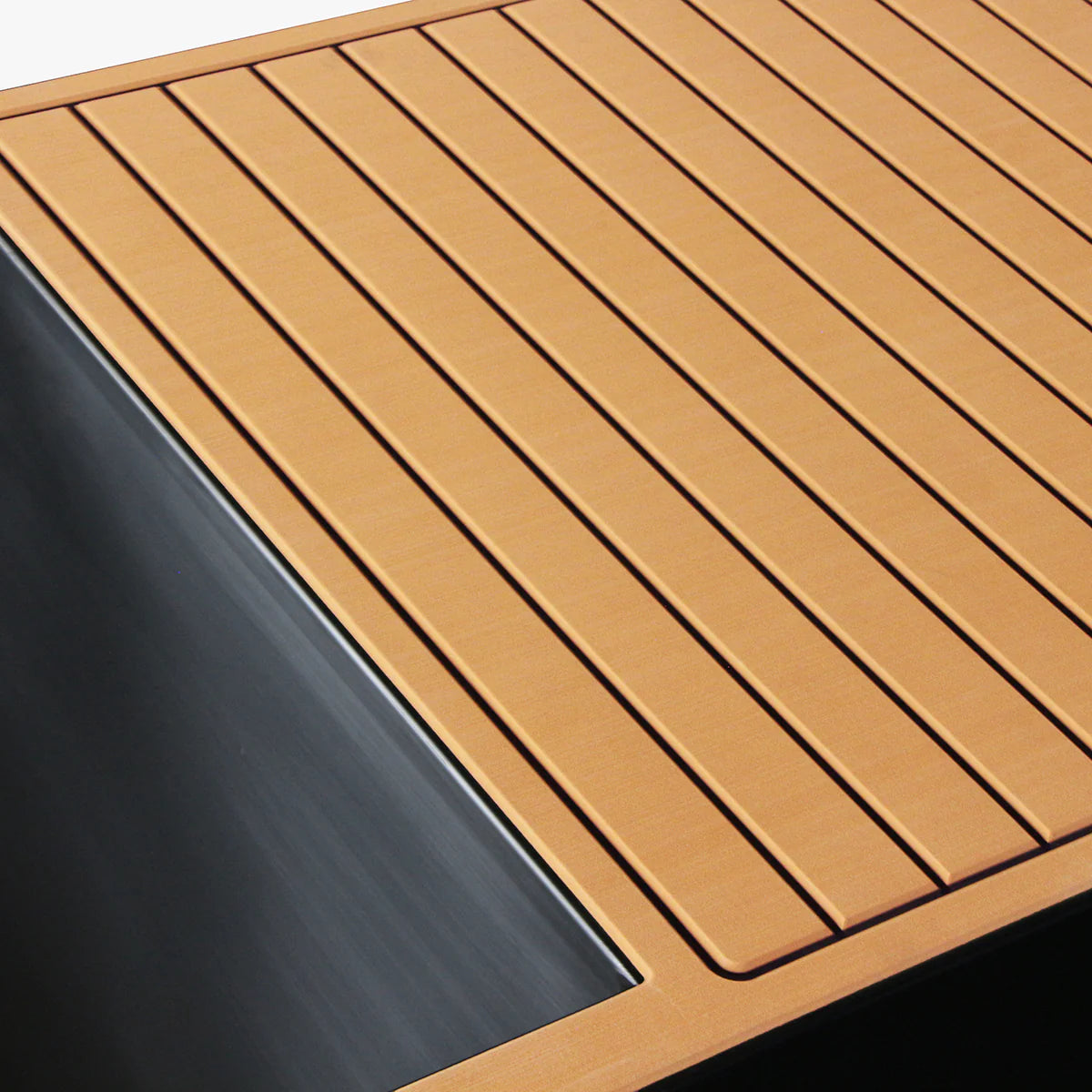 Close-up of a wooden deck with a slat pattern