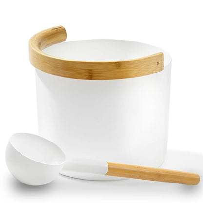 white bucket with wooden handle and ladle on a white background
