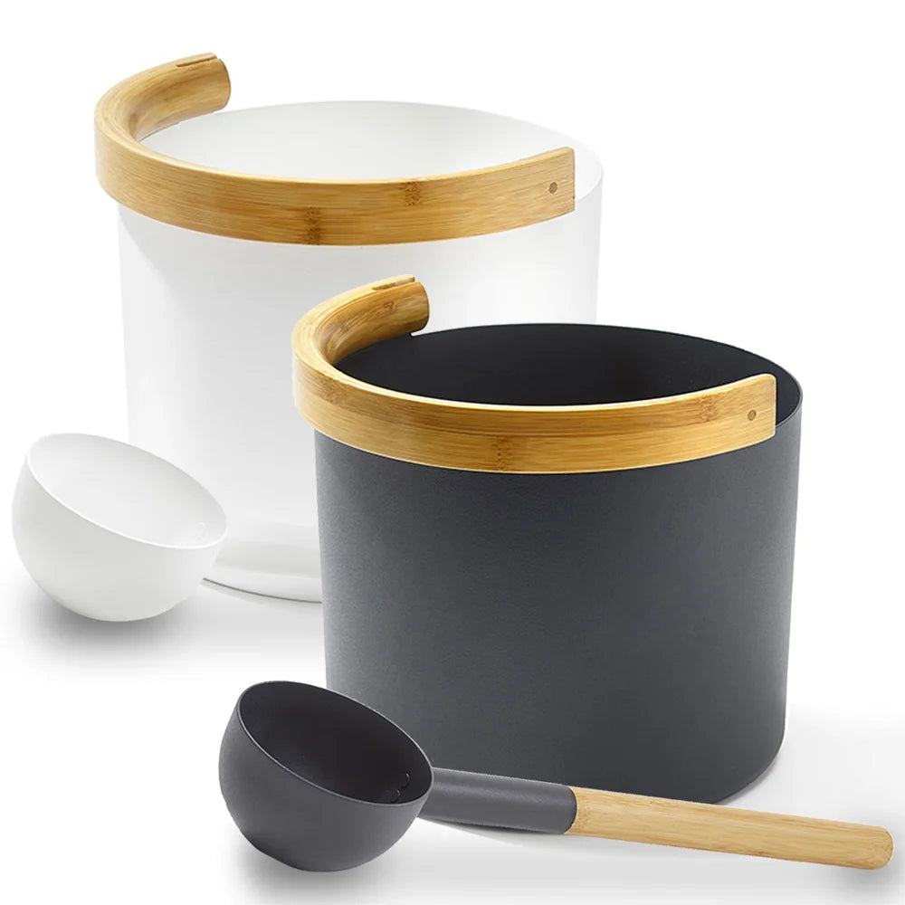 white and black buckets with wooden handle and ladle on a white background