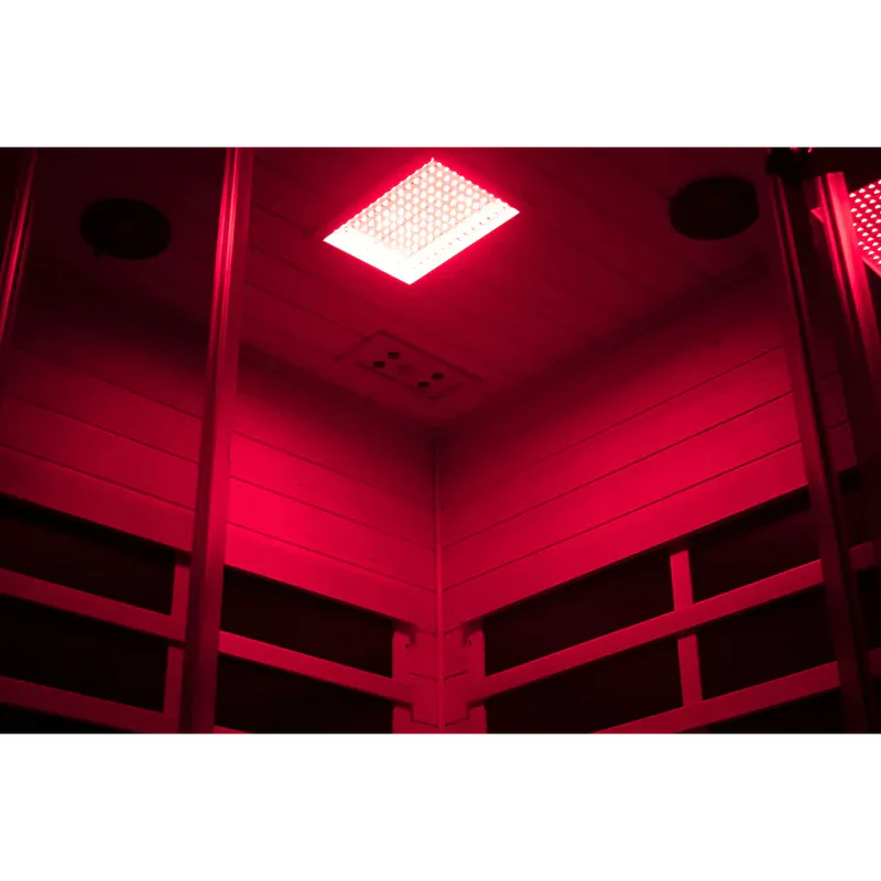 Red-lit indoor setting with a ceiling light fixture.