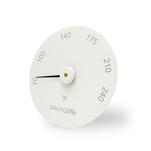 White thermometer with temperature markings on a white background