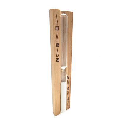 A wooden hourglass timer with a clear glass hourglass filled with white sand, set between two light wood blocks with black countdown markings.