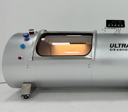 Silver hyperbaric chamber with 'Ultra Airvida' branding on a white background
