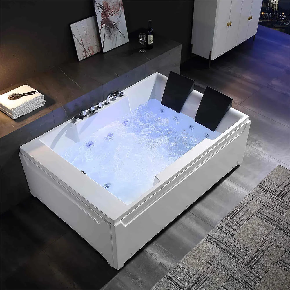 Modern white bathtub with LED lighting in a stylish bathroom setting.