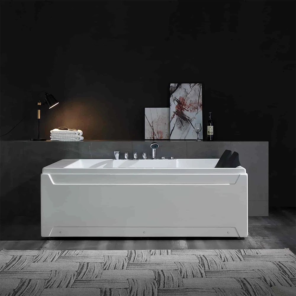 Modern white bathtub in a darkly decorated bathroom