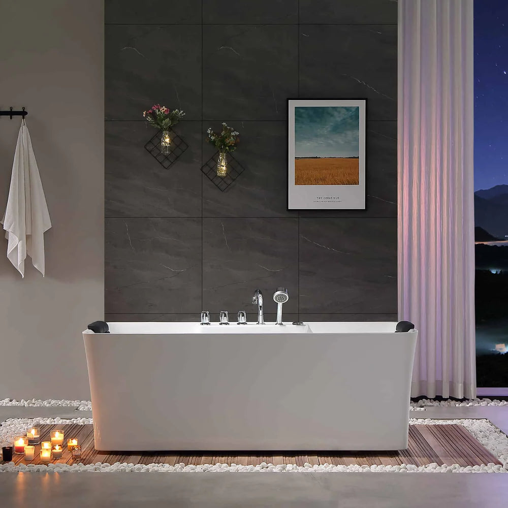 Modern bathroom with a freestanding bathtub, candles, and decorative elements.