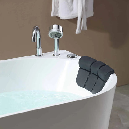 Bath tub with faucet and shower head, black bath pillow on edge