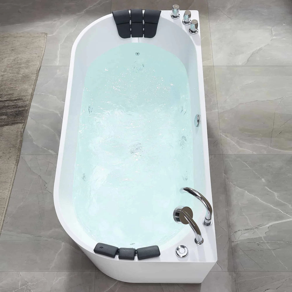 Modern freestanding bathtub with jets on a tiled floor