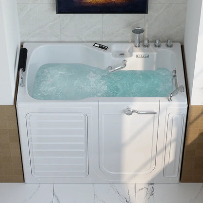 White walk-in bathtub with water inside, featuring a control panel and faucet, in a tiled bathroom.