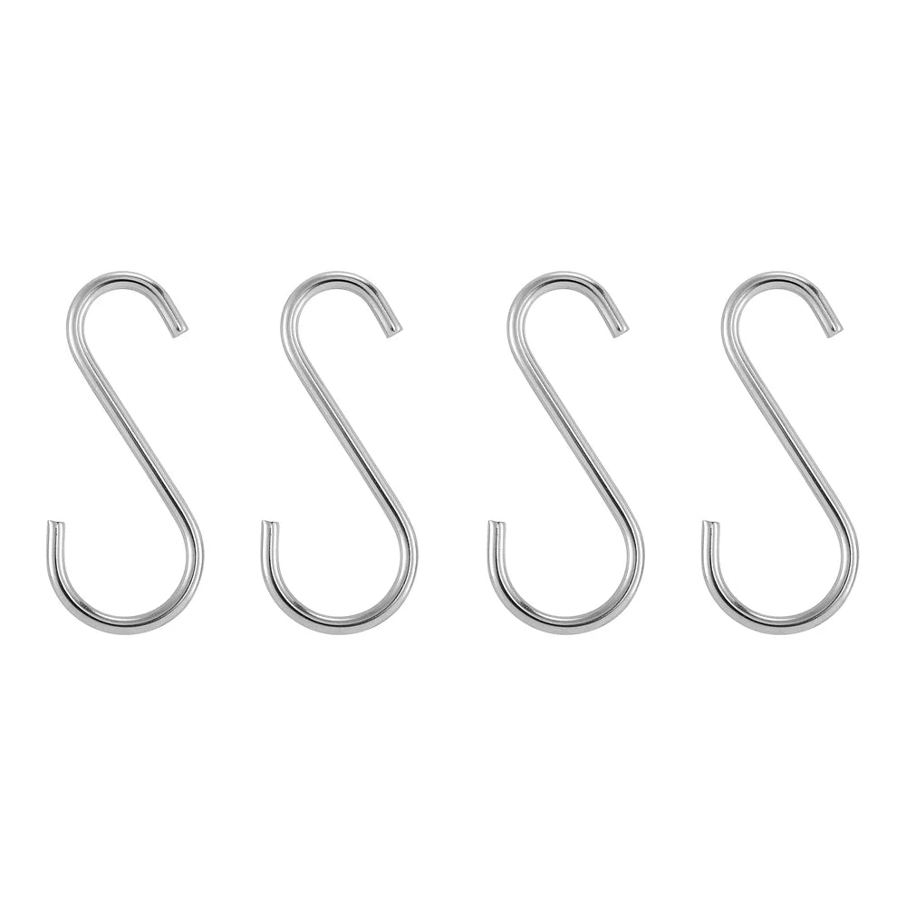 Four metal S-hooks on a white background