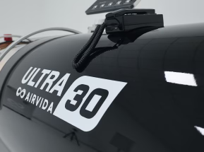 Black hyperbaric chamber 
with 'Ultra 30 Airvida' branding on a white background