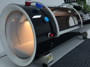 Close-up of a hyperbaric chamber with interior light on a vehicle.