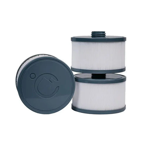 Two cylindrical filters with a blue cap on a white background
