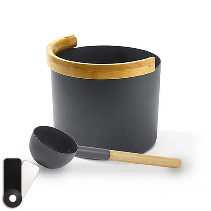 black bucket with wooden handle and ladle on a white background