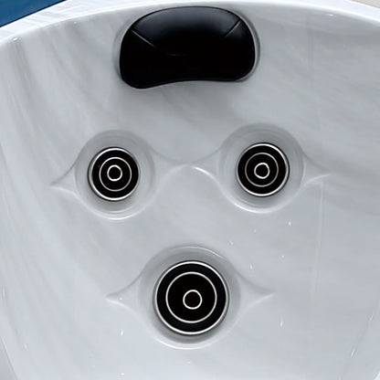Close-up of a hot tub with three circular jets.