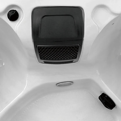 Close-up of a hot tub in a white interior setting