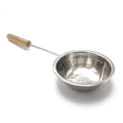 Stainless steel ladle with wooden handle on a white background