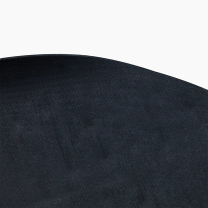 Close-up of a black fabric texture on a white background