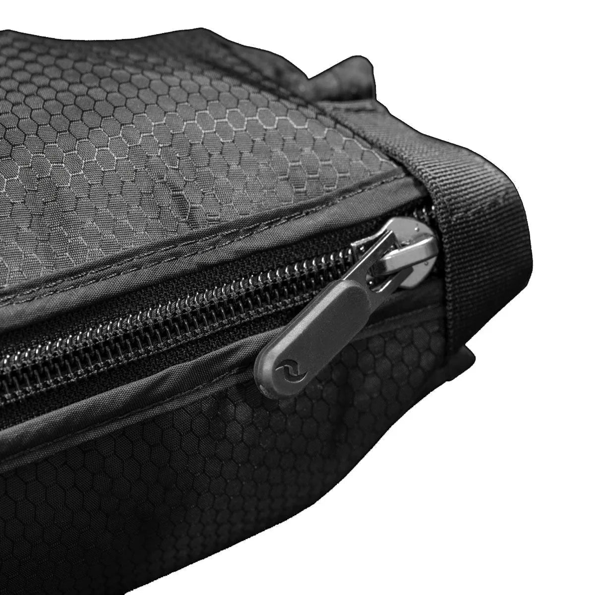 Close-up of a black tactical pouch with a zipper on a white background