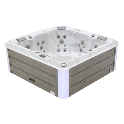 Hot tub with gray exterior and white interior on a white background