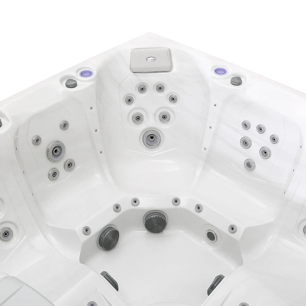 Close-up of a hot tub with multiple jets on a white background