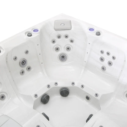 Close-up of a hot tub with multiple jets on a white background