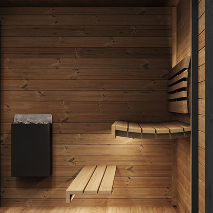 Wooden sauna interior with benches and a heater.