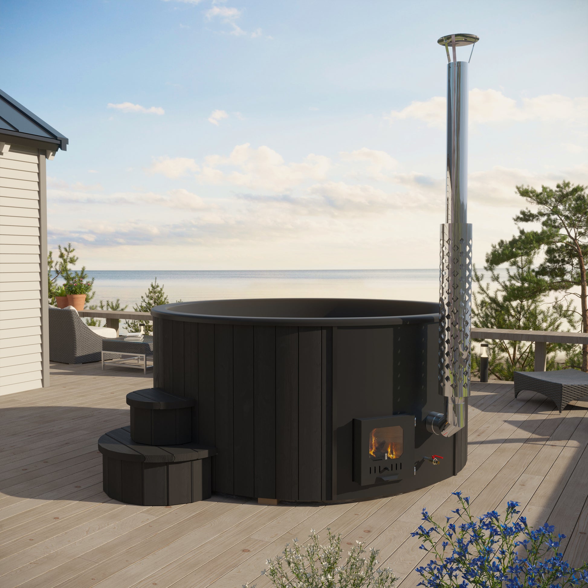 Black outdoor hot tub in a wooden deck with ocean view
