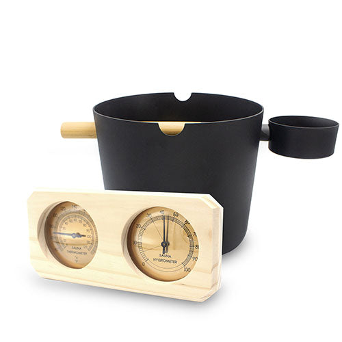 Black pot with a wooden hygrometer on a white background