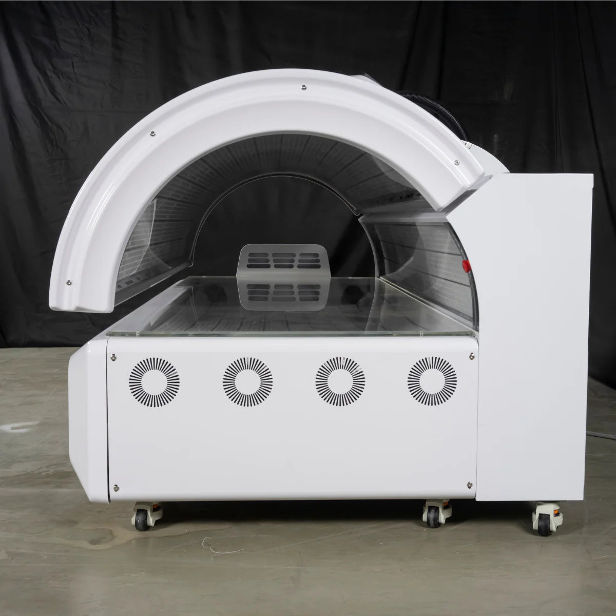 White Tanning bed on a black background