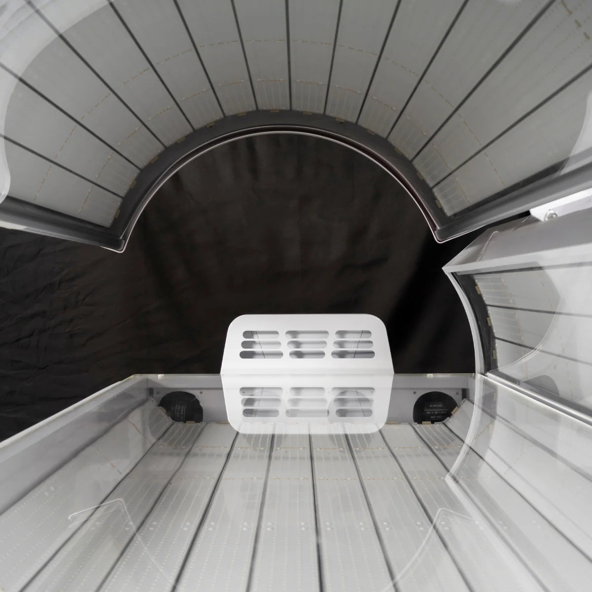 red light booth interior with a UV light fixture.