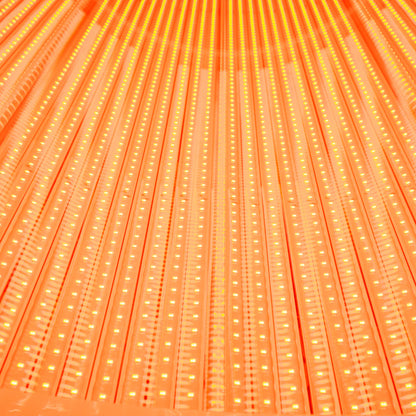 Close-up of orange LED strip lights with a grid pattern