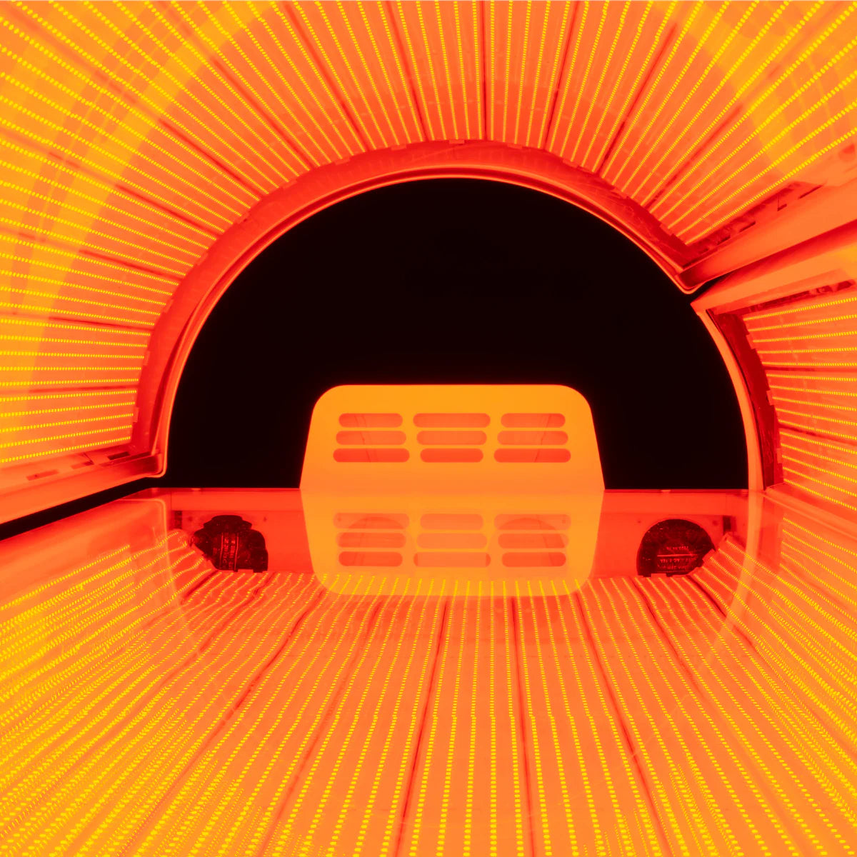 red light booth with a glowing orange interior