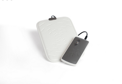 White pemf pulsepad with a gray control on a white background