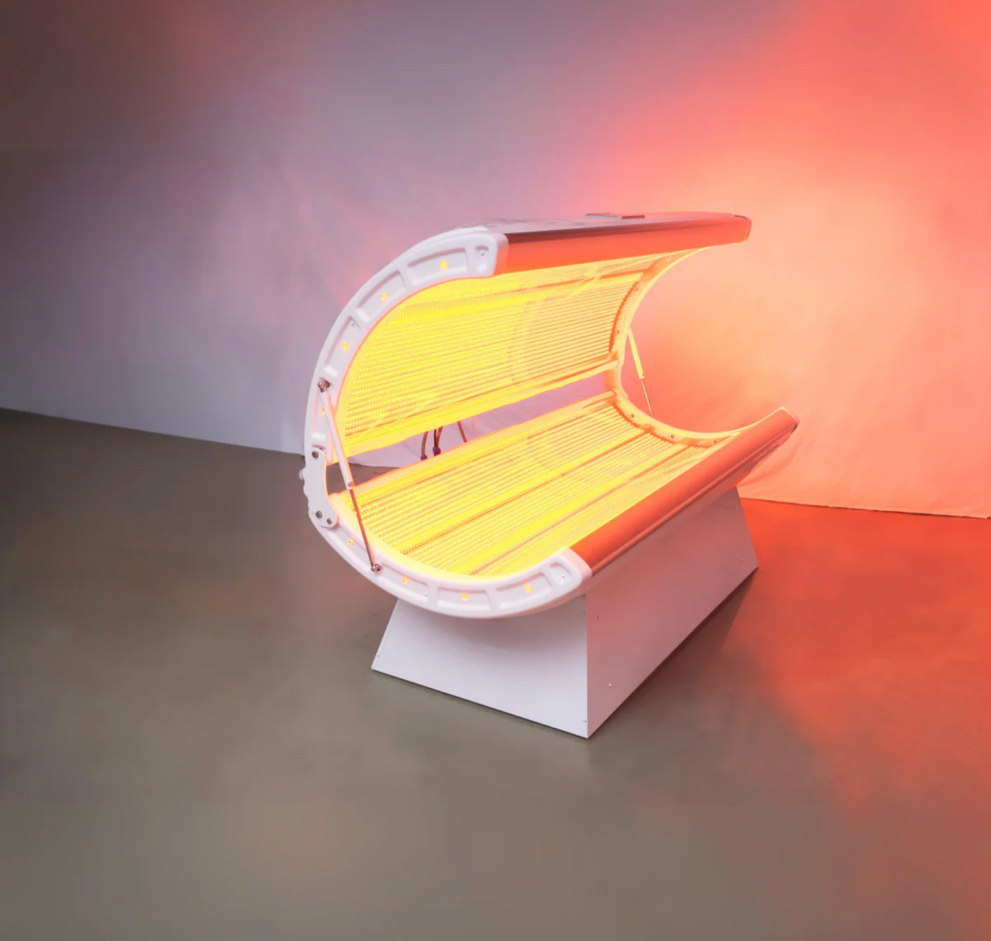 White red light therapy bed open emitting red light