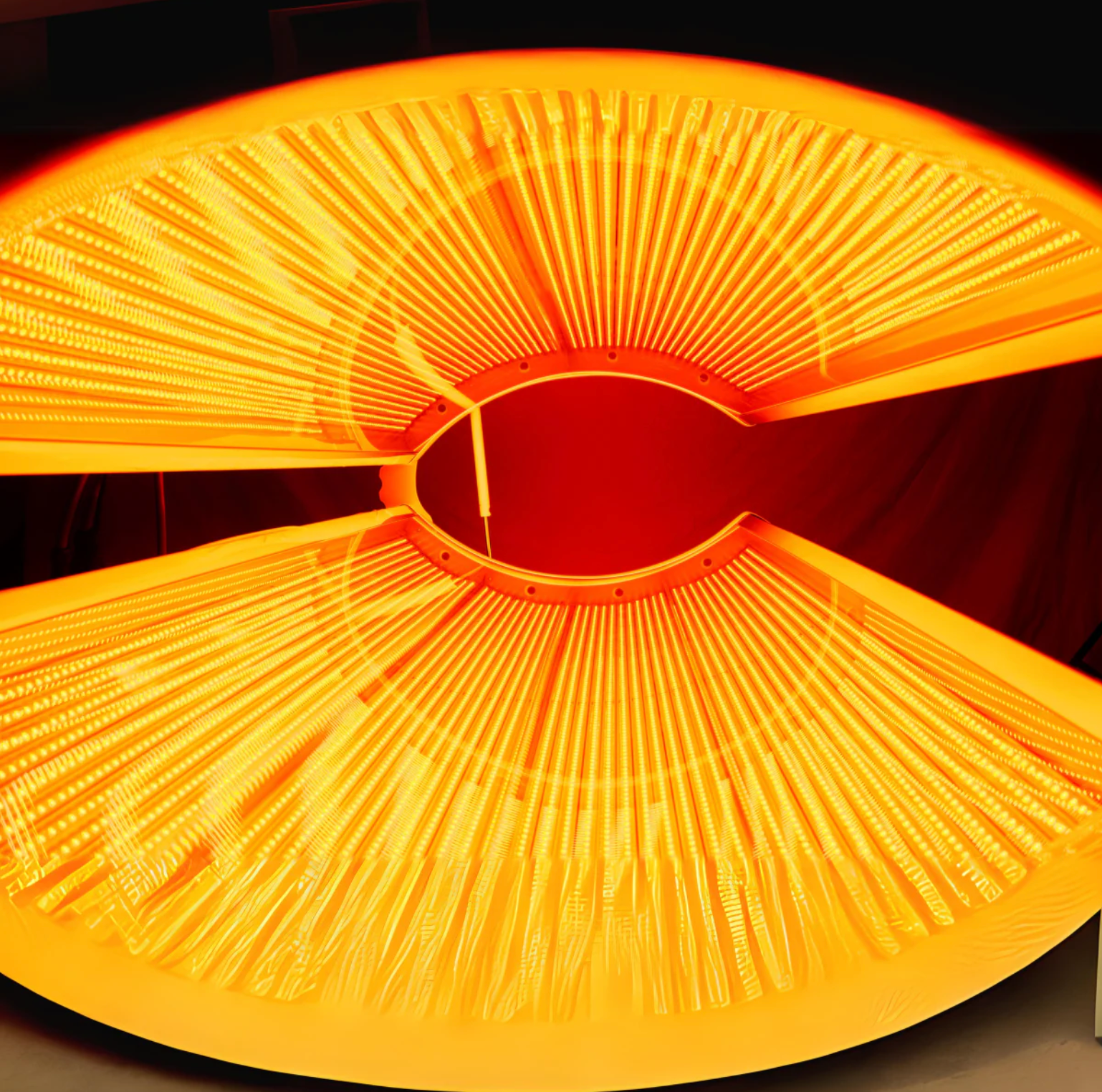 Close-up of a bright orange and yellow light fixture