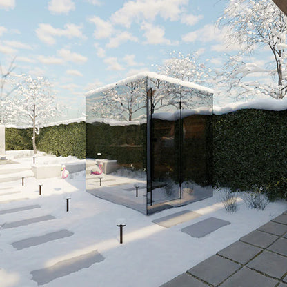Modern mirrored cabin in a snowy landscape with trees and a clear sky.