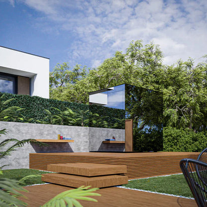 Modern outdoor setting with a reflective mirror and wooden bench against a blue sky.