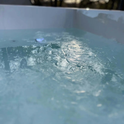 Close-up of a textured blue surface with reflections