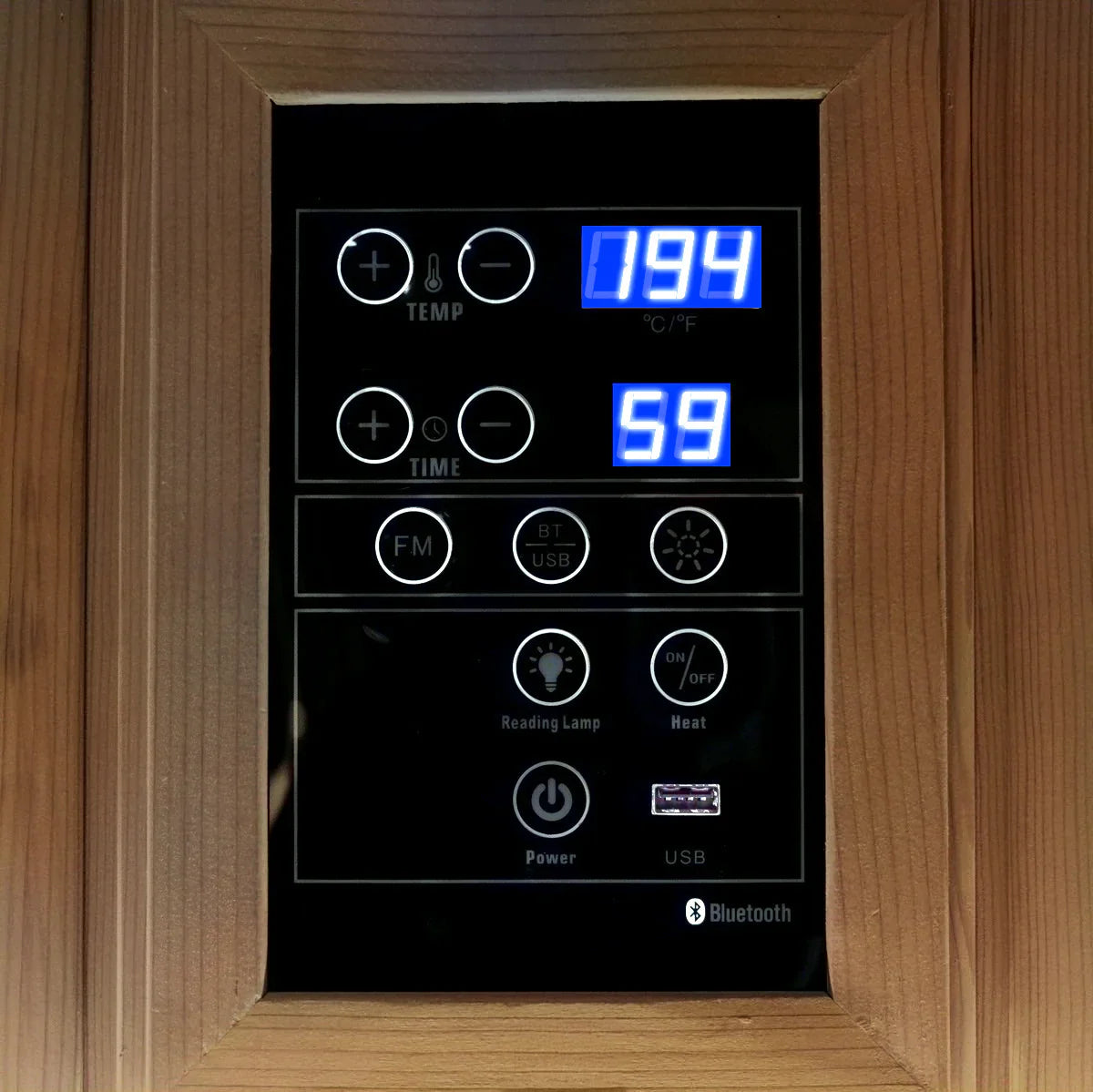 Control panel with digital display and buttons on a wooden frame