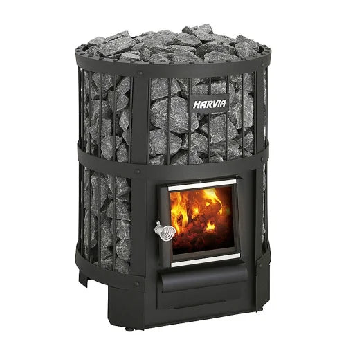 A Harvia wood-burning stove with a black metal frame, filled with dark gray stones, and showing a glowing fire through the front door, isolated on a white background.