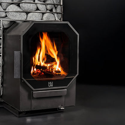 Black fireplace with flames inside, set against a dark background.