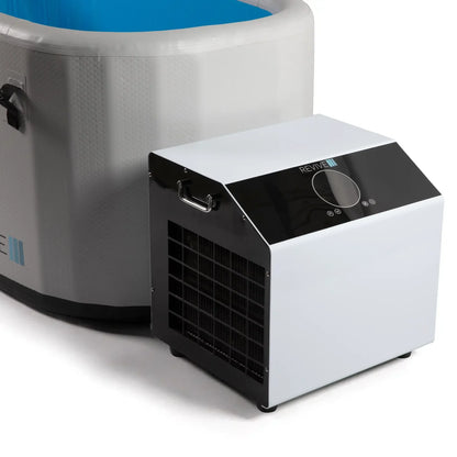 Portable cooler next to a cold tub on a white background