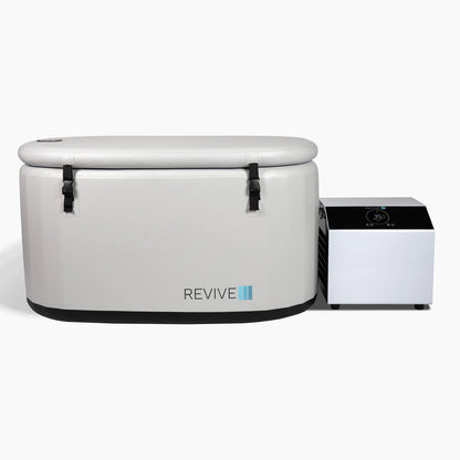 White cryosauna with 'REVIVE' branding on a white background